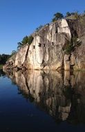 birdhouses on rock above water, sweden, archipelago ostholmen