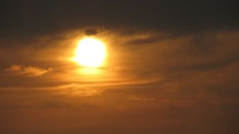 sunset sun over the clouds