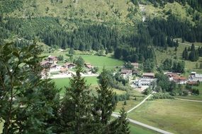 panoramic view of a village in the mountains on a sunny day