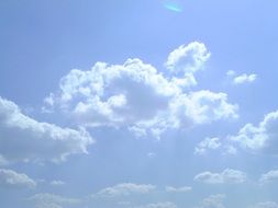 white clouds on the sky in summer