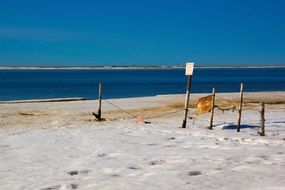 travel ban on a sandy beach