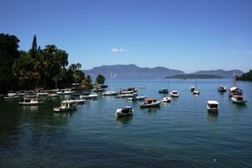 boats on water sunny landscape