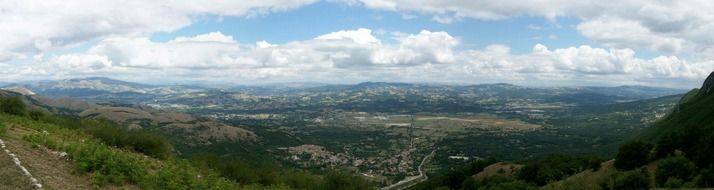 view of scenic countryside from mountain, italy