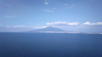 blue landscape, sea and mountain at skyline, italy