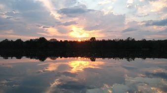 tranquil mirroring sunset lake