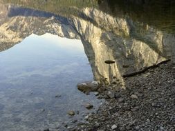 mirror image of alpine mountain in a lake