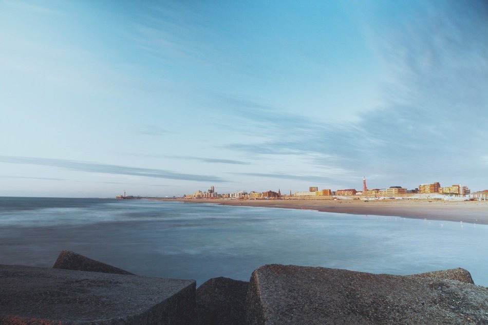 landscape of a town by the ocean beach