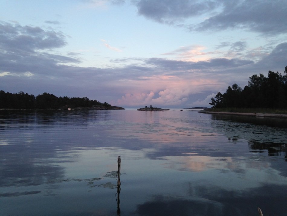 purple clouds above the water