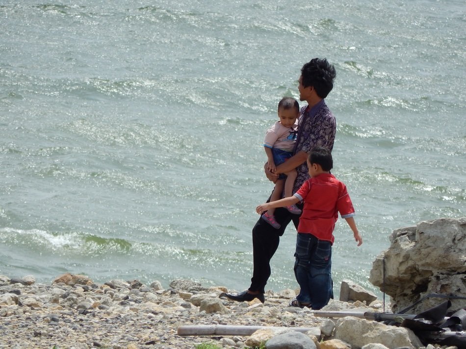 family by the river