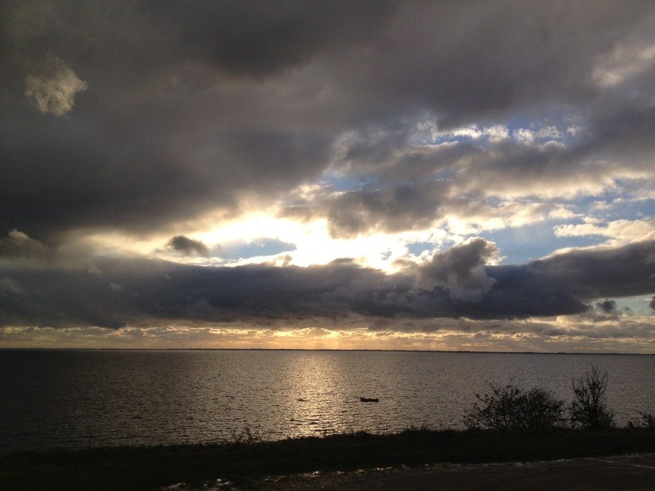 dark cloudy sky above the beach in Denmark