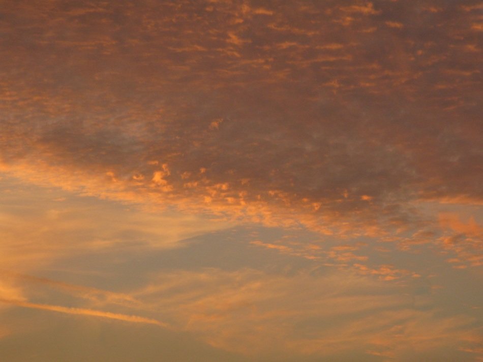 Beautiful pink and orange clouds at a beautiful sunset in the evening
