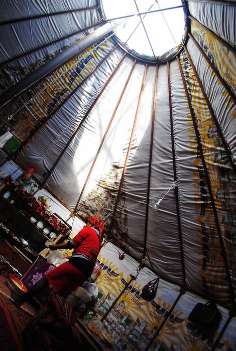 photos of nomads in a yurt
