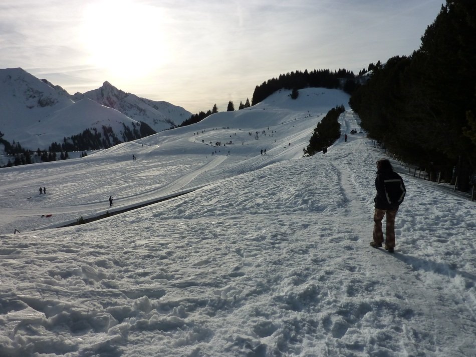 people in the mountains in winter