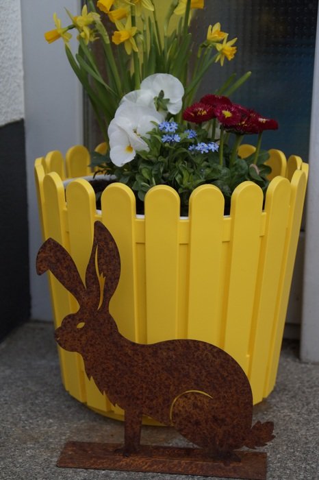 easter decorations with flowers in pot