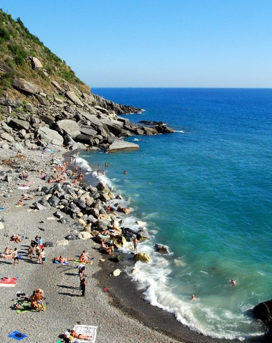 Beach near the mountains, liguria, italy