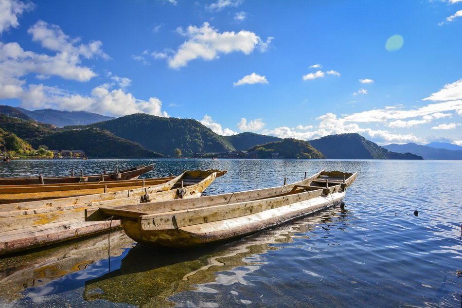 boat on the water under the blue sky