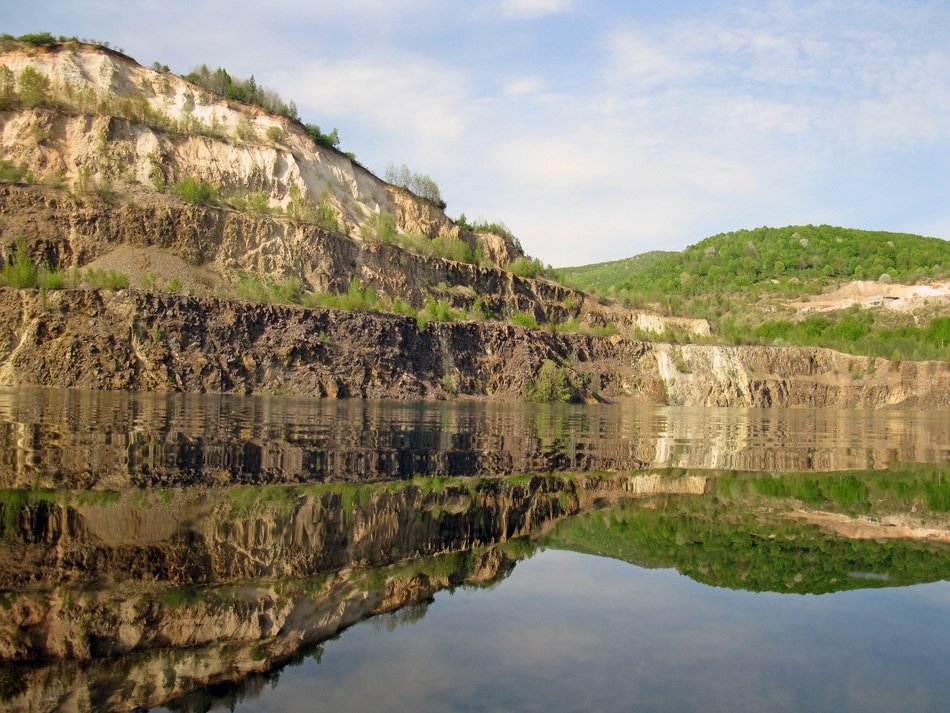 mirror image of a mountain in a lake