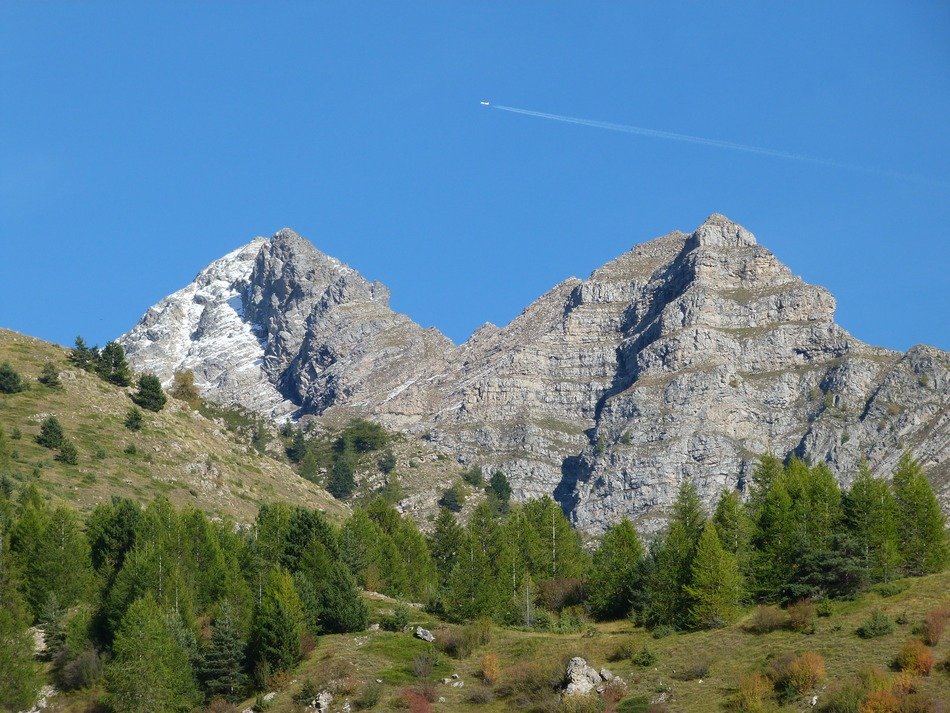 two scenic mountain summits in alps