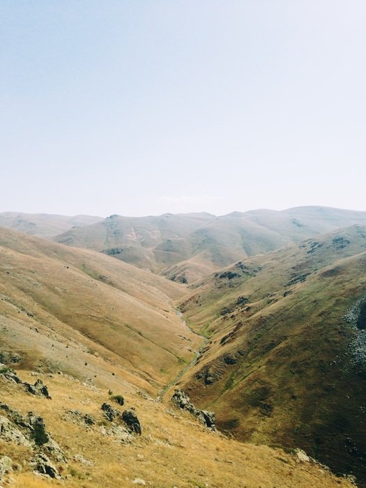 valleys and hills on a sunny day