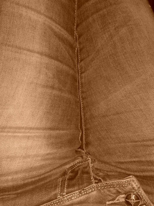 feet in jeans closeup