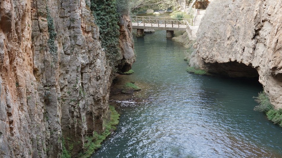 landscape of bridge over the river among the rocks