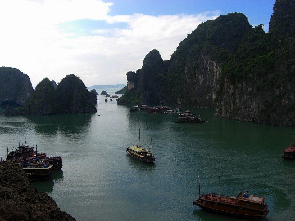boats in the bay among the rocks