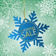 Snowflake sale tag on a snowy background