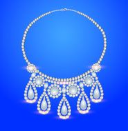 female necklace with pearls on a blue background