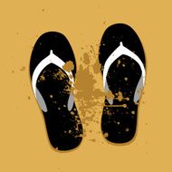 Beach sandals on sand
