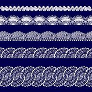 set of white lace ribbons on a blue background