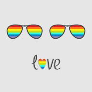 Two glasses with rainbow lenses Word love heart