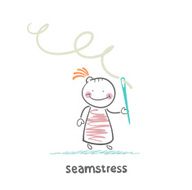 seamstress holding thread and needle N2