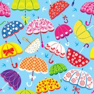 seamless pattern with colorful umbrellas on blue background