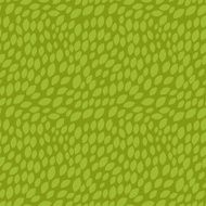 Seamless abstract pattern with stylized green leaves