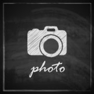 vintage illustration with camera sign on blackboard background