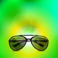 sunglasses on a green background