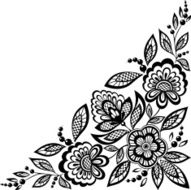 corner ornamental lace flowers are decorated in black and white
