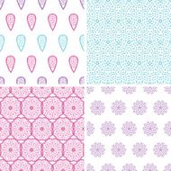 Four abstract feather motives seamless patterns set