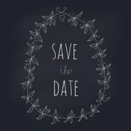 Save the date wreath on a blackboard