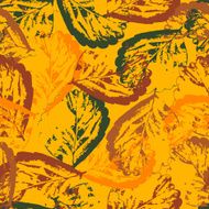 Seamless texture of leaves on orange background