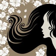 Closeup vintage woman with flower in beautiful long hair