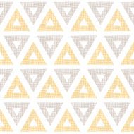 Abstract textile ikat yellow brown triangles seamless pattern background