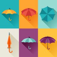 Set of cute multicolor umbrellas in flat design style