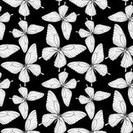 seamless background of butterflies black and white colors