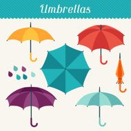 Set of cute multicolor umbrellas in flat design style N2