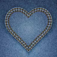 Abstract blue jeans heart on denim background