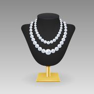 Pearl necklace on a rack N2