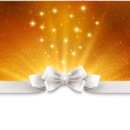Abstract magic gold light background with white ribbon