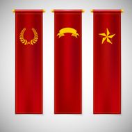 Vertical red flags with emblems