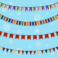 Set of festive colored flags on curved ropes